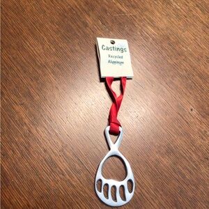 Paw Print Ornament with Red Ribbon